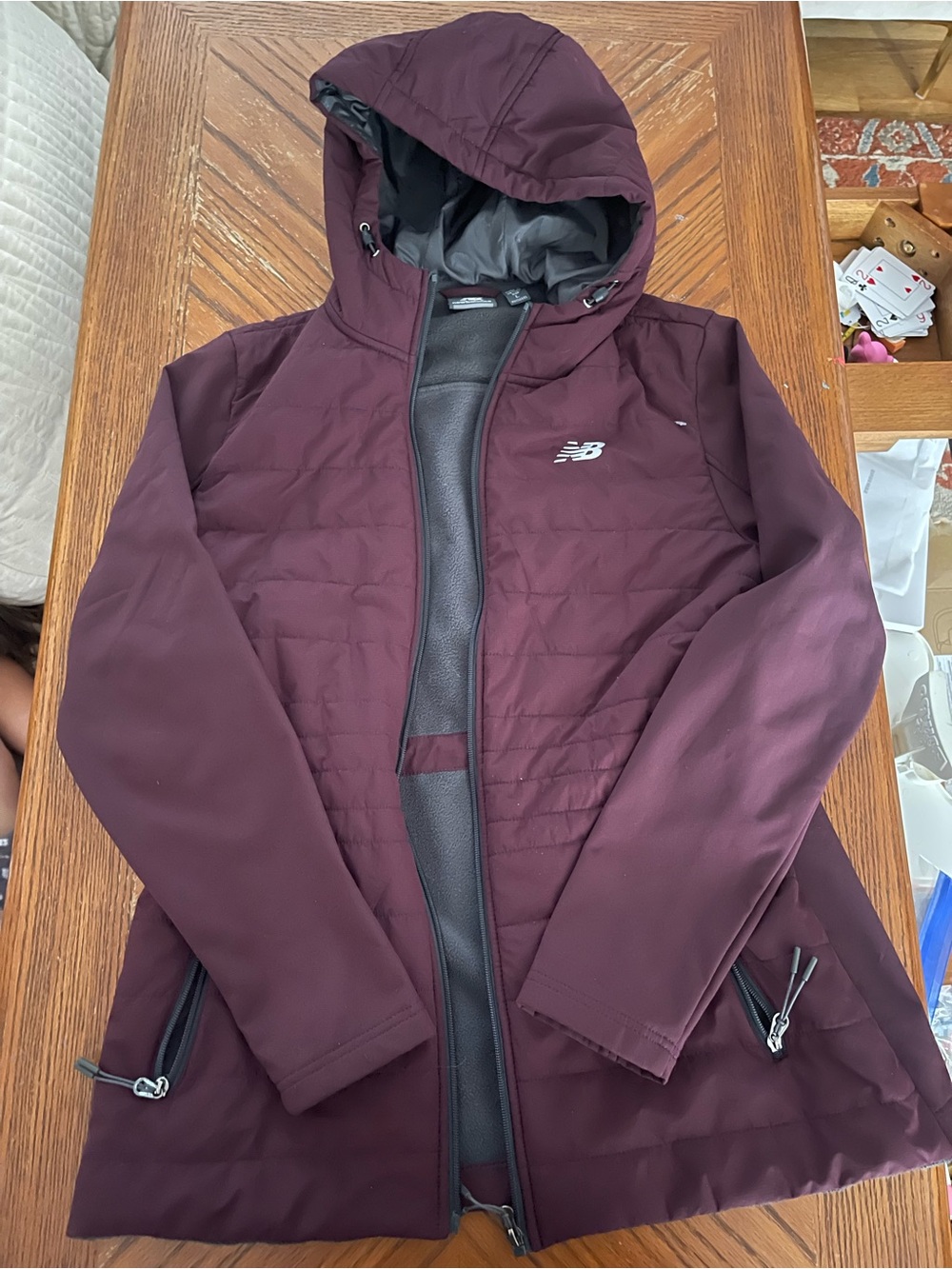 New Balance Women's Hooded Puffer Jacket in Plum